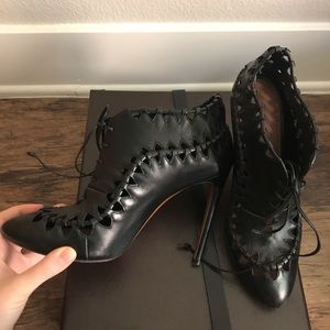 Alaia leather low heel lace up boots